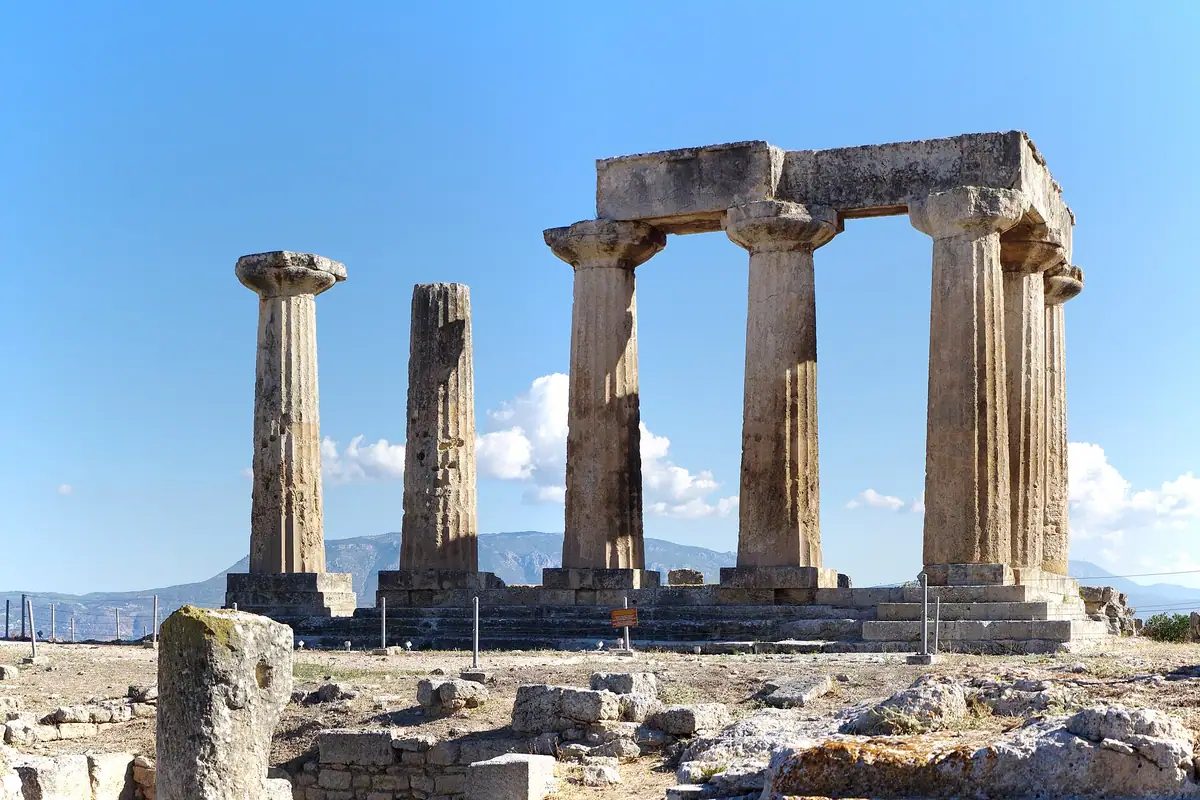 The Temple of Apollo at Ancient Corinth, with Acrocorinth behind it.